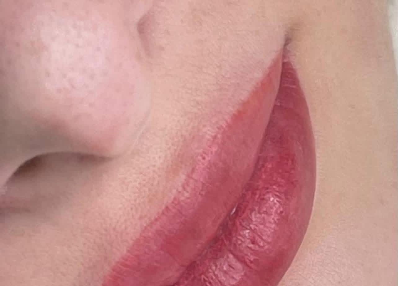 Lips with soft blush pigment giving an even, natural tint